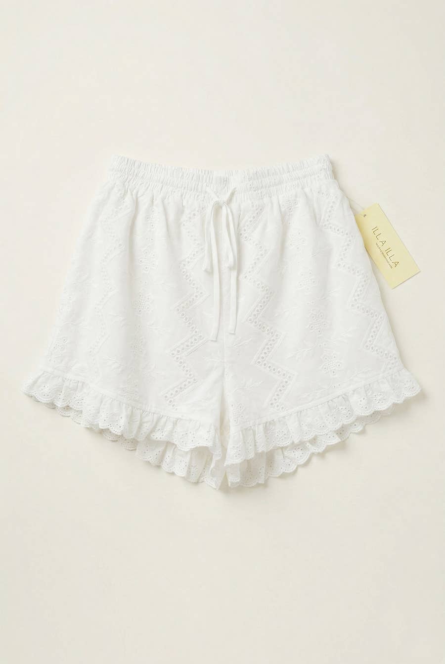 Pearl Embroidered Ruffle Shorts in Off White