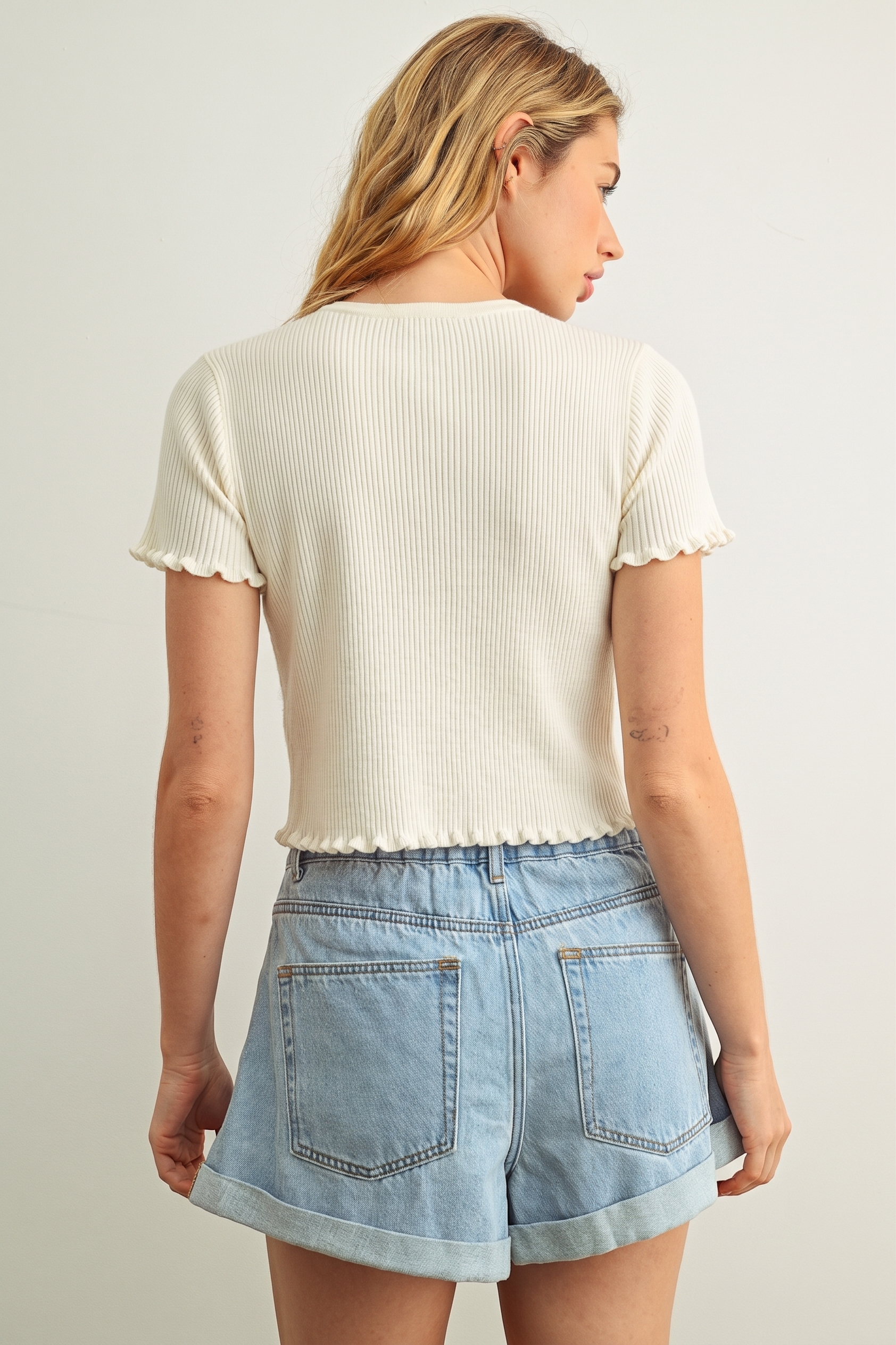 Rosie Ruffle Hem Ribbed Top in Cream