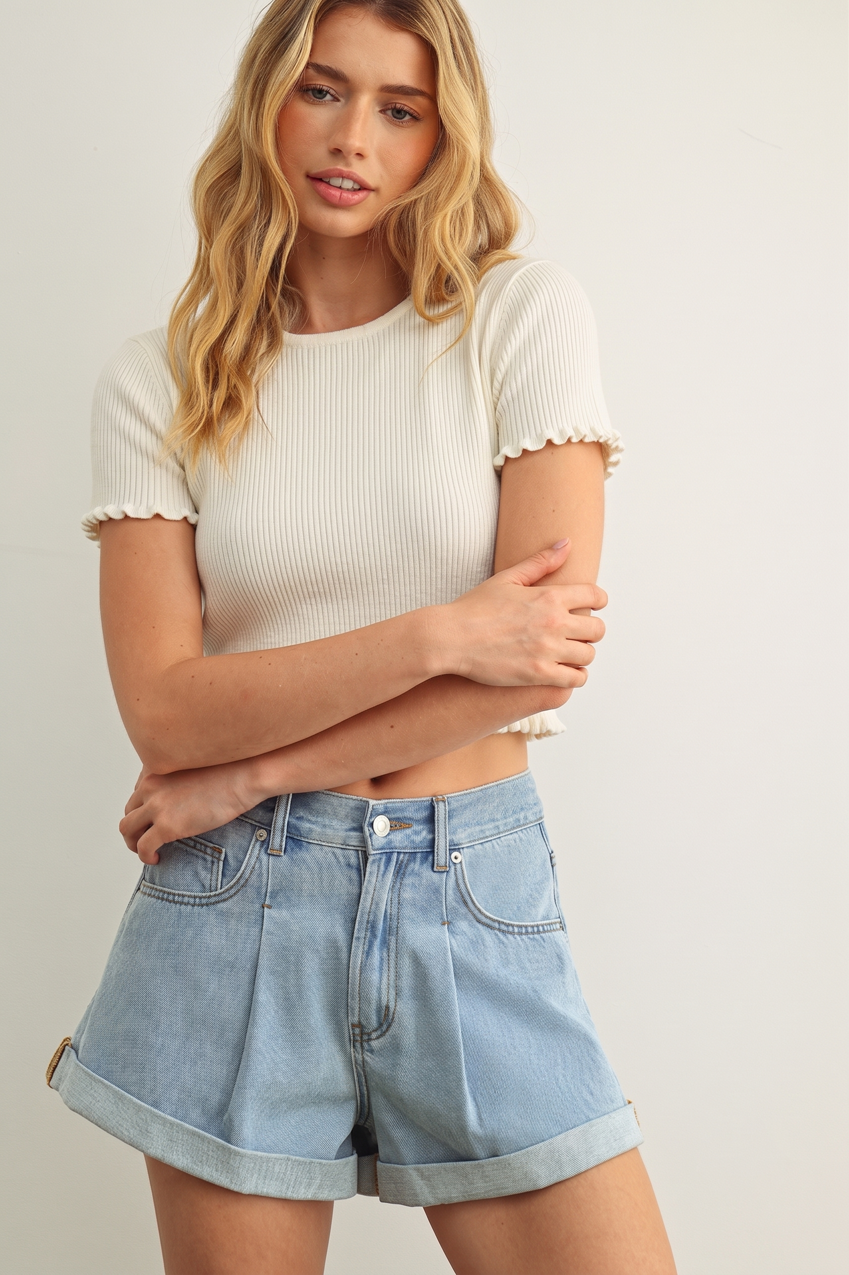 Rosie Ruffle Hem Ribbed Top in Cream